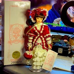 AVAILABLE - VTG Classic Creations porcelain dolls.  "Winter Holly" #M121551